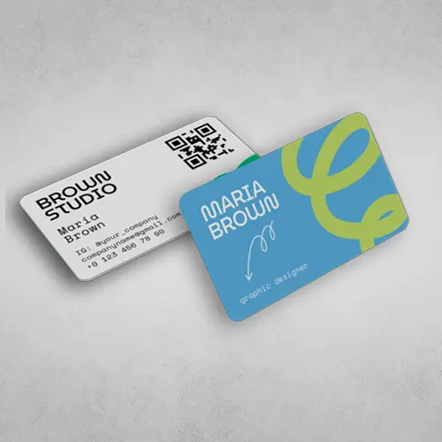 Two business cards with rounded corners featuring a modern design.