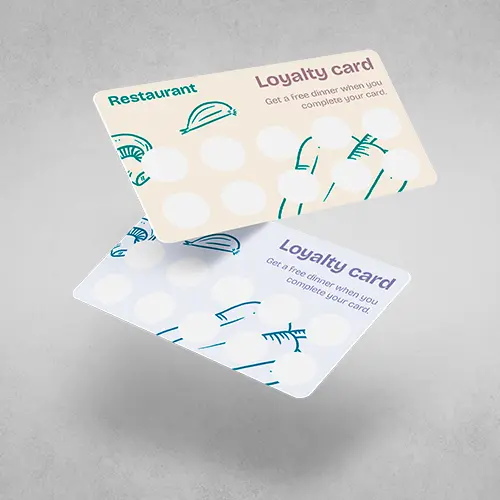 Some custom loyalty cards of restaurant floating and with sticker spaces