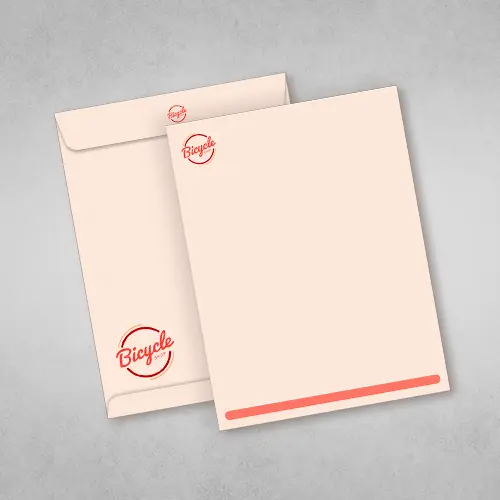 Custom envelopes for business communication. Showing a tangerine and orange catalog envelope